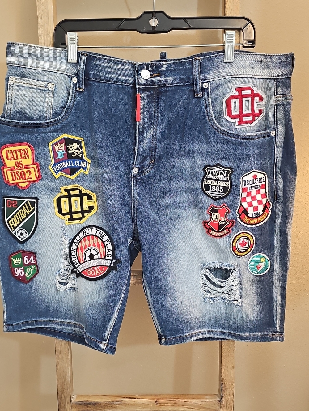 DSQUARED2 Blue Distressed Denim Shorts with Multicolor Patches Made In Italy